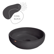 black round concrete vessel sink